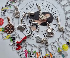 Thomas Sabo clip, charms in lovely designs, all in good condition. 10E each charm.