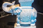 White ceramic elephant stand