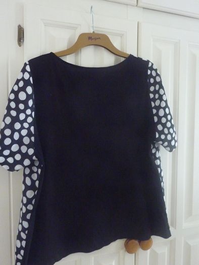 Carolyn Donnelly  polka dot top PENDING