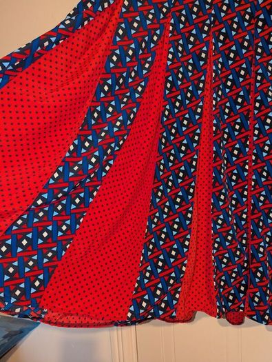 Beautiful multi colored dress with belt to adjust size
