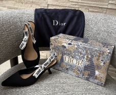 Black sling backs