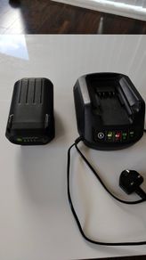 gardenline grass trimmer battery and charger.
