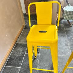 Pair of yellow stools