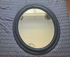 black oval mirror