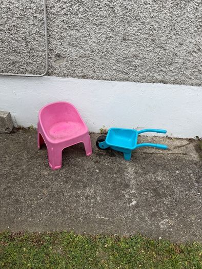 kids chair and toy wheel barrow