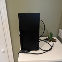 xbox series x with 2 controllers