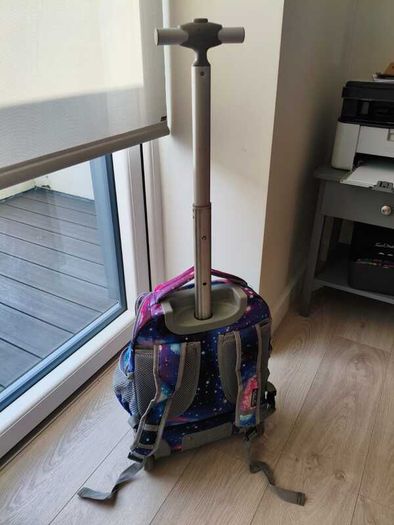 Galaxy print rolling backpack with extendable handle