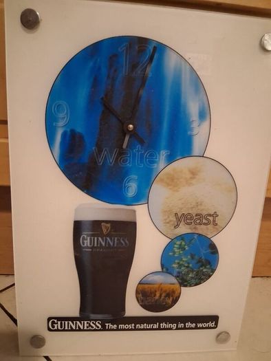 Large Guinness advertising wall clock