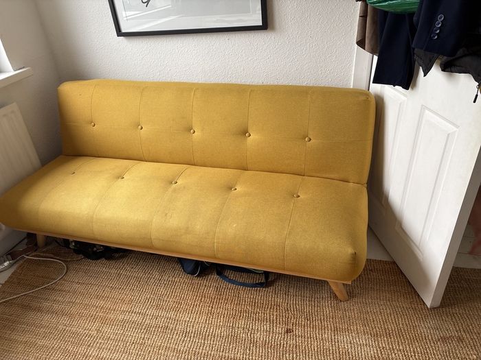 Yellow retro sofa bed