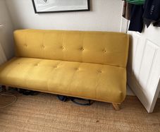 Yellow retro sofa bed