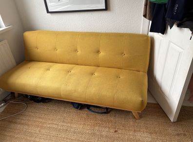 Yellow retro sofa bed