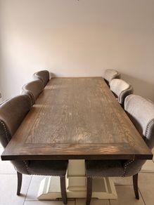 Solid wood table with dining chairs