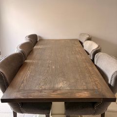 Solid wood table with dining chairs