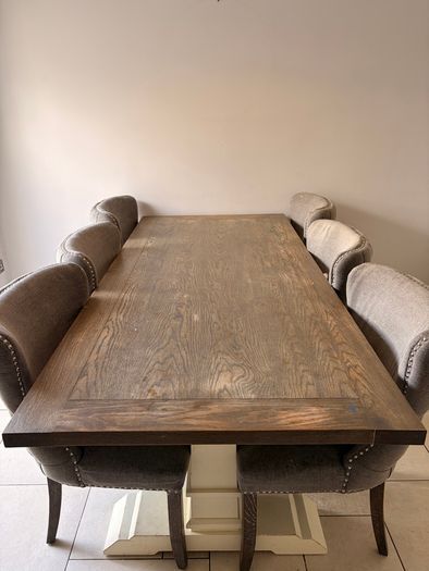 Solid wood table with dining chairs
