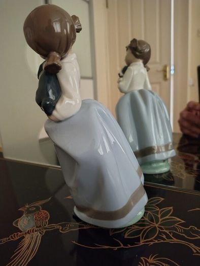 Vintage Nao by Lladro. Girl holding Sleepy Puppy. 1987.  #1029