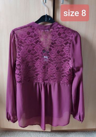 New lovley blouse with lace on the back