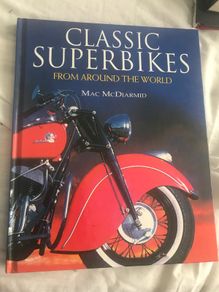Classic Motor bike book from around the world hard back large in size beautiful illustrations and pictures in colour