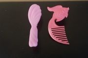 Mini doll hair brushes