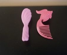 Mini doll hair brushes