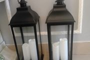 Floor lanterns standing 27 ins high and 21 ins width