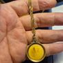 Unique Item. Antique pendant with a faded picture of a lady. Image 4