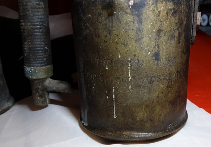 three vintage brass torches,