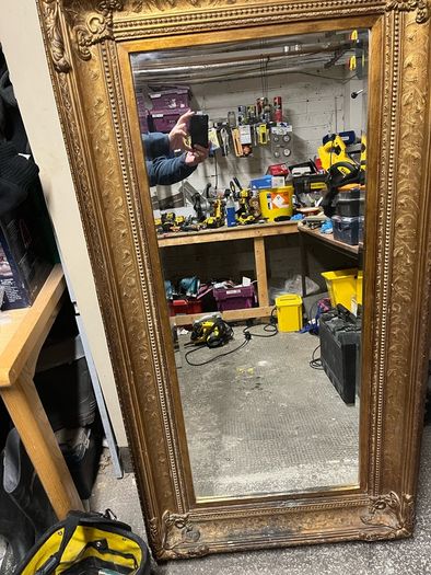 Mirror in sturdy frame