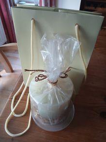 New. 3 items.  Dunnes stores. 110 hour burn candle. Frosted stand. Gift bag.