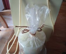 New. 3 items.  Dunnes stores. 110 hour burn candle. Frosted stand. Gift bag.