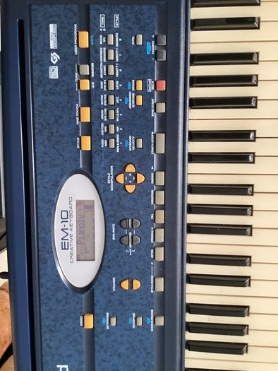 EM-10 Creative Keyboard with music stand and keyboard stand in excellent working condition for quick sale