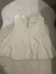 white sleeveless blouse