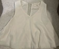 white sleeveless blouse