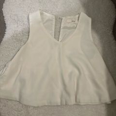 white sleeveless blouse