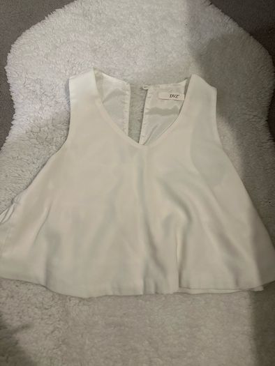 white sleeveless blouse