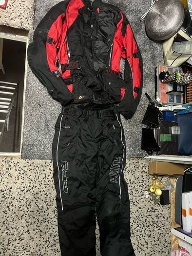 motorbike suit gloves and helmet
