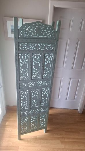Carved wooden room divider