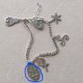Vintage sterling silver bracelet with charms. Please note that only one charm is not sterling silver. It is a small size, approximately 16/17 cm. Image 6