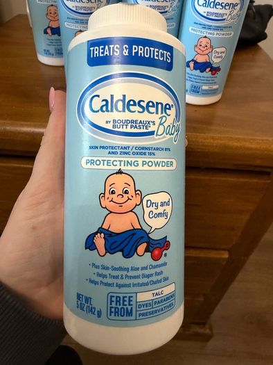 8 bottles of caldesene baby powder