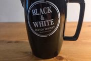 Black and white scotch whiskey jug