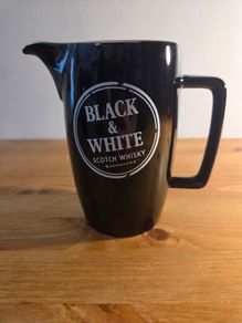 Black and white scotch whiskey jug