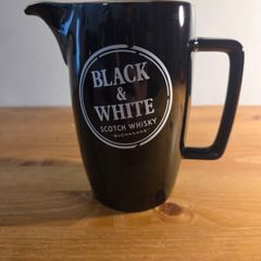 Black and white scotch whiskey jug