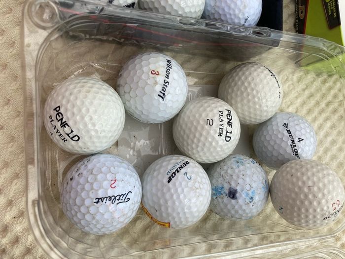Two Dozen Used Golf Balls.