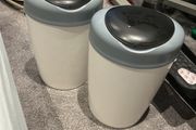Two Tommy tippee nappy bins