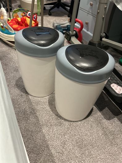 Two Tommy tippee nappy bins