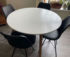 Round White Dining Table + Modern Chairs