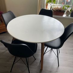 Round White Dining Table + Modern Chairs