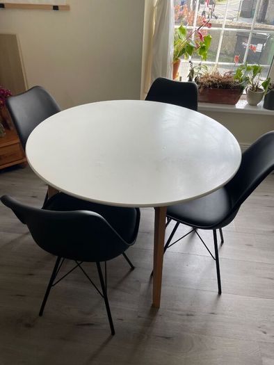Round White Dining Table + Modern Chairs