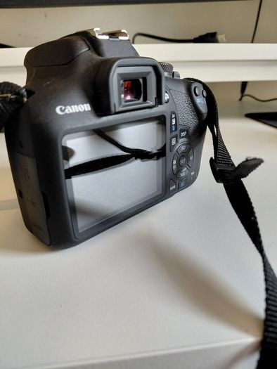 Canon 2000D with 18-55mm lens and bag