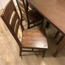 Dark Walnut dining table and chairs Image 3