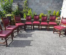 Victorian dining chairs crafted from oak with red leather upholstered seats
